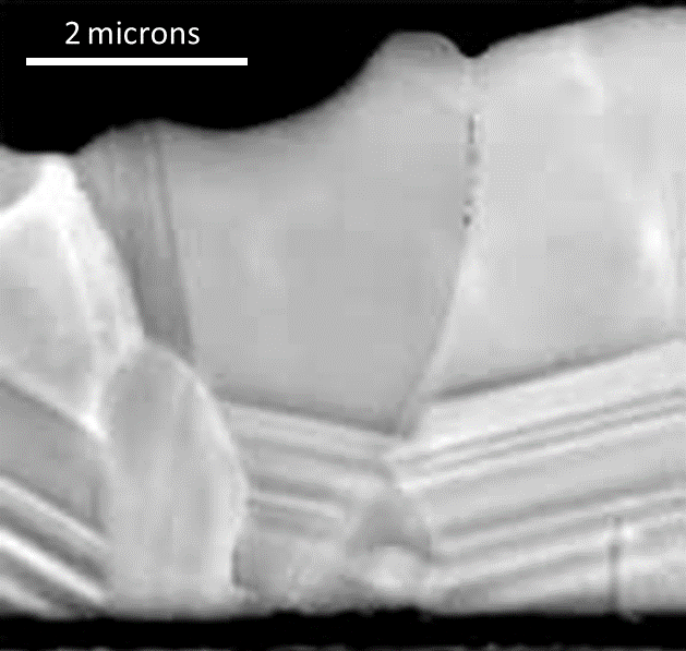 SEM image of a CdTe/CdS photovoltaic heterojunction in cross-section.